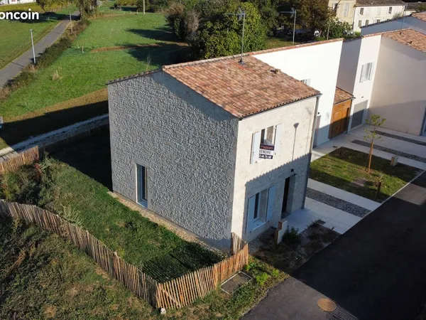 Maison avec garage et jardin