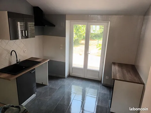 Maison Mitoyenne