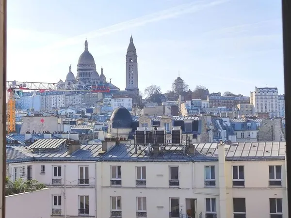 Exceptionnel Duplex avec 2 Terrasses Panoramiques en dernier étage au coeur de Château Rouge