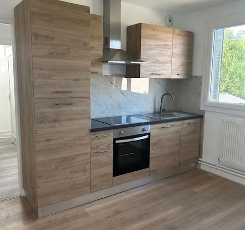 Appartement F4 avec jardin et garage