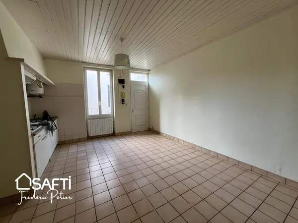 Maison de ville de 46m2 avec une chambre et un bureau.