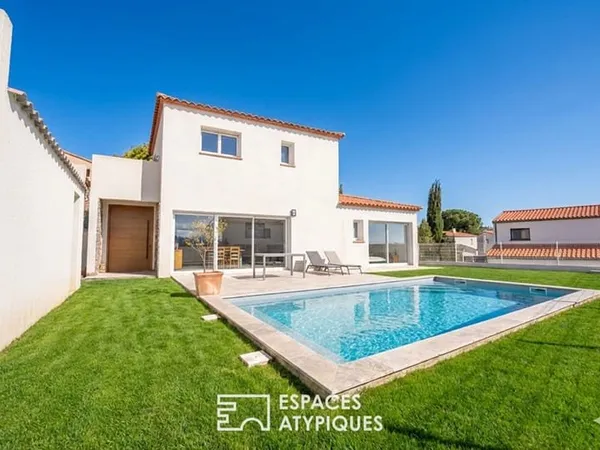 Villa récente avec jardin, un écrin récent aux accents de pierre a proximité de Perpignan