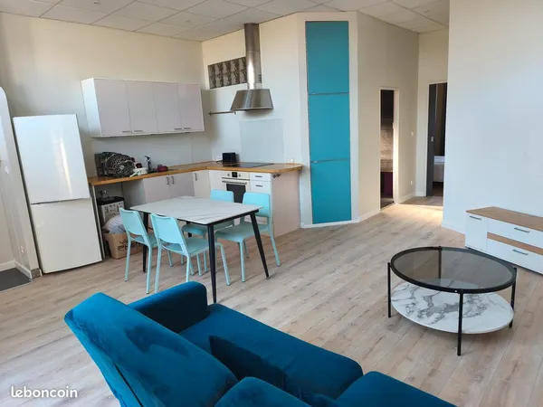 Appartement T2 de 48 M2 avec rez de jardin et place parking