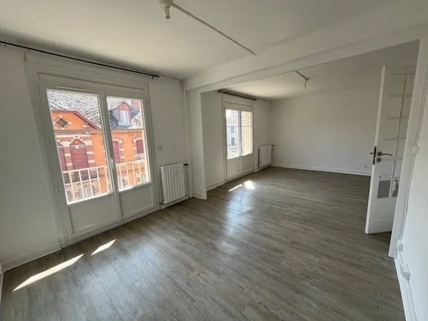 APPARTEMENT DE TYPE 4 75 M² AVEC CAVE ET GARAGE PRIVATIF