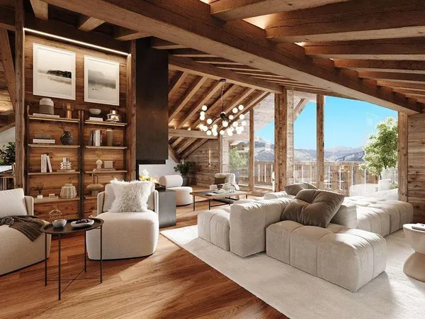 Duplex en dernier étage avec balcons dans un chalet haut-de-gamme