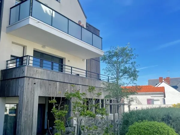 Appartement T2 loué avec balcon 2 places parking À 600 m de