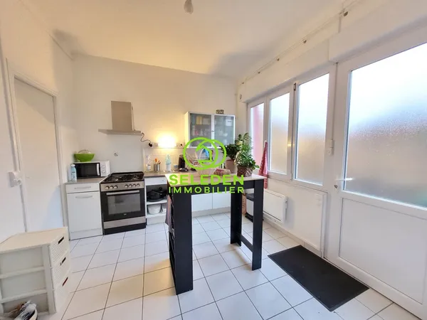 Appartement T3 plain-pied avec cour