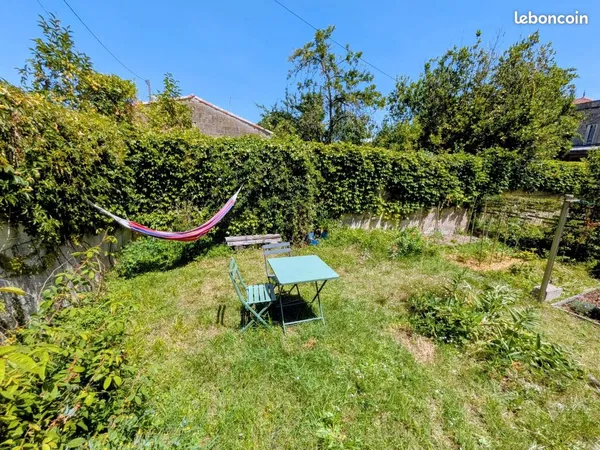 Appartement ancien rénové avec jardin