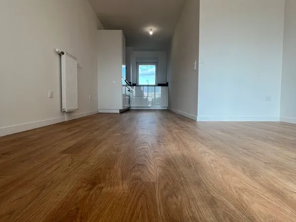 Première occupation - Appartement 63 m² + balcon + parking