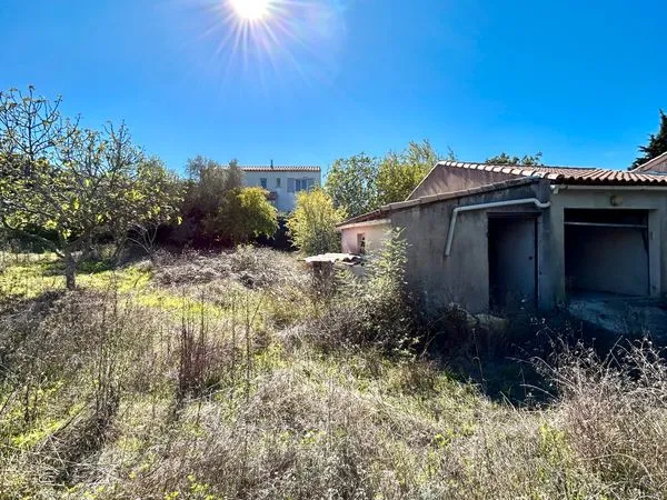 Terrain viabilisé 523 m2 avec garage existant