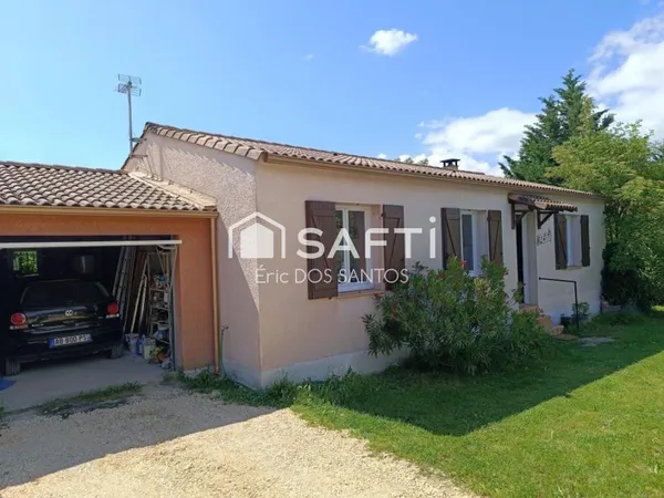 Maison plein pied ,terrain arboré,garage ,parking