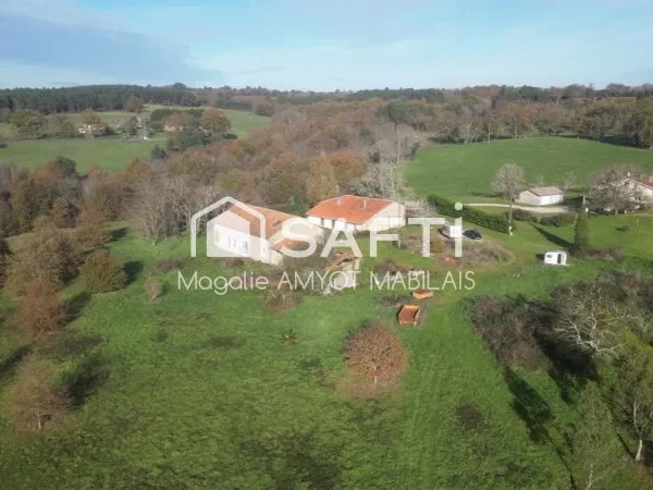 Superbe propriété de 26 ha : 2 maisons à rénover + 1 étang de 5ha