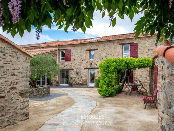 Propriété en pierre avec deux habitations pensées pour l'accueil touristique