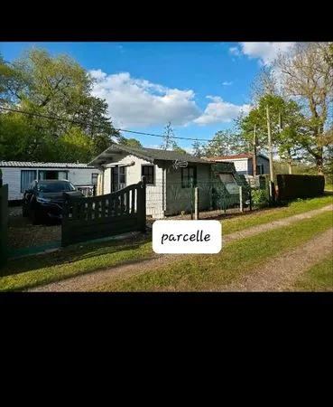 PARCELLE avec Chalet,caravane, mobil-home