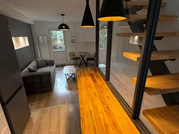 Charmant triplex avec patio arboré