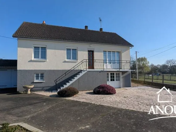 MAISON AU CALME AVEC GARAGES ET SOUS-SOL AMÉNAGÉ
