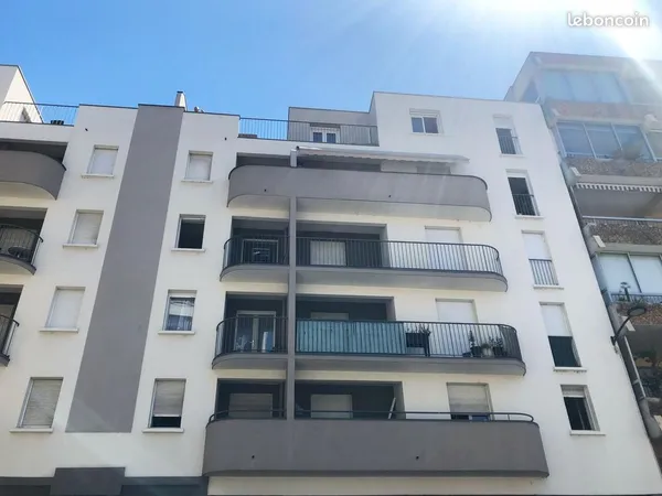 Appartement 78 m2 4 pièces avec cave et box garage centre ville