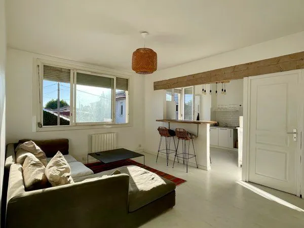 Appartement 2 pièces de 46 m² avec terrasse, garage et parking