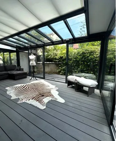Appartement style loft RDC jardinet