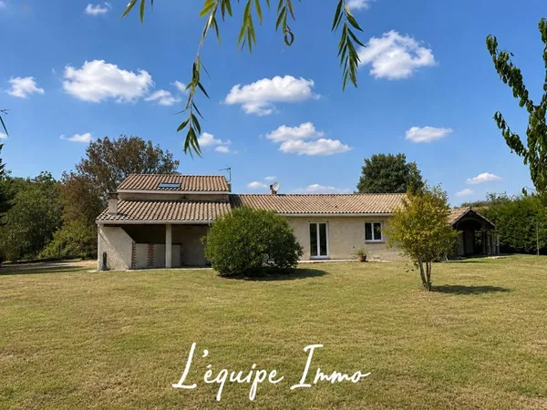 Maison 7 pièces avec grand jardin arboré