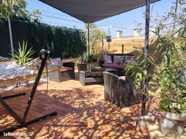 Maison 13ème avec jardin terrasses garage et véranda