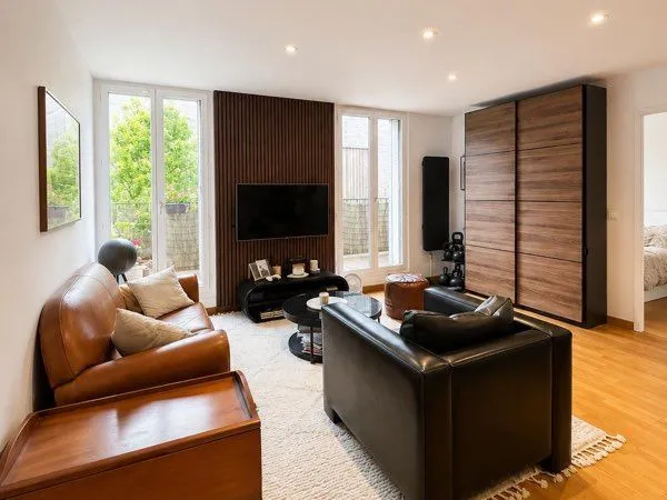 Appartement 43,8 m² avec balcon et parking - Résidence verdoyante au pied du métro Serge Gainsbour