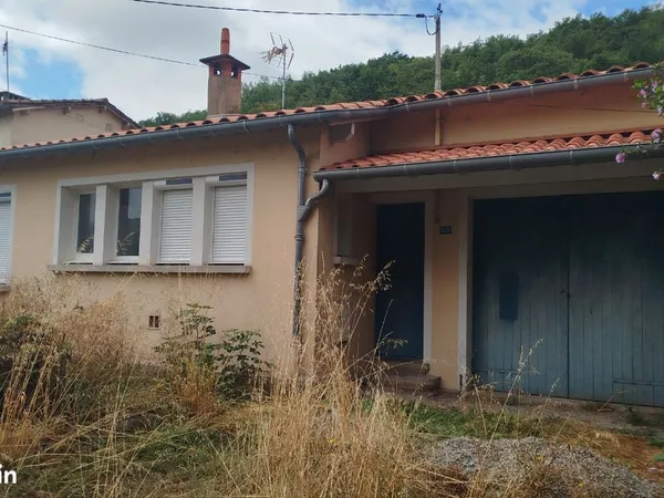 Location maison individuelle mitoyenne côté garage