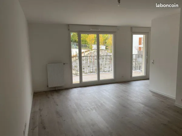 APPARTEMENT T3 66m2 + 2 places parking