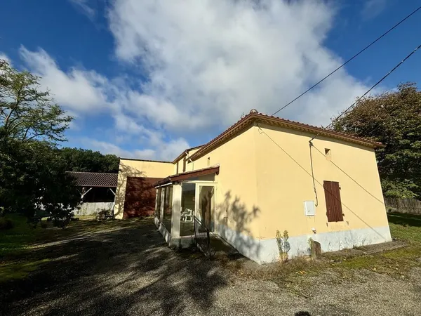 Charmante propriété comprenant une maison d'habitation ainsi q