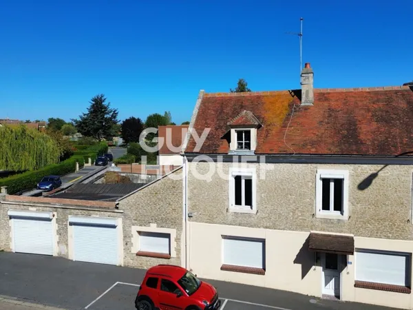 Maison à vendre de 5 pièces de 111.38 m² avec double garage