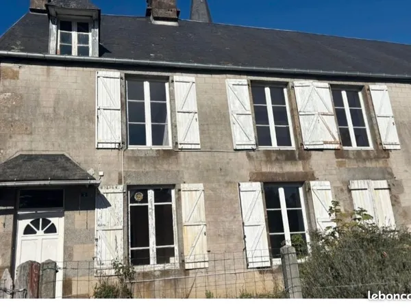 Maison mitoyenne plein bourg