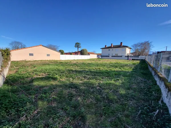 Terrain constructible plat de 619 m² à Laloubère - Proche Tarbes