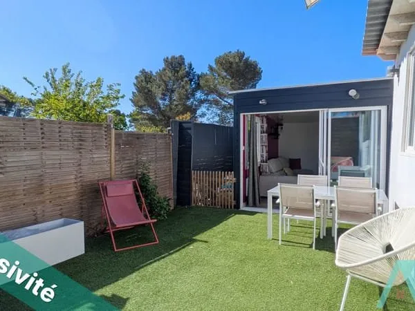 Habitation légère 3 pièces 65m2 avec jardinet et parking