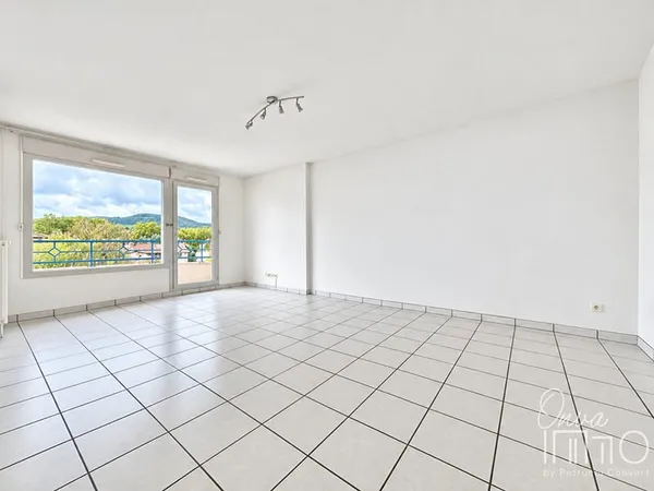 Neuville Centre - Lumineux T2 de 53m² avec balcon et garage