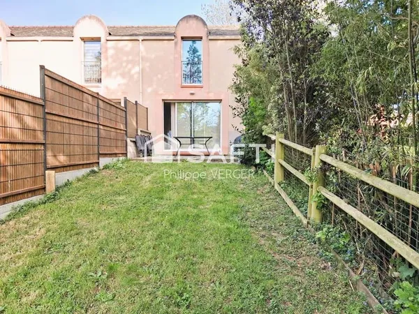 Appartement T3 de 71 m2 avec jardin privatif et 2 places de stationnement