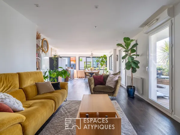 Appartement T3 de 84 m² avec terrasse de 60 m² paysagée, box et place parking