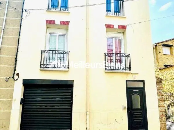 Immeuble de deux T3 avec terasses et grand garage