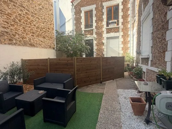 Maison en copropriété avec jardin