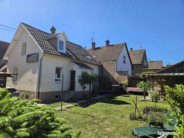 Cadre de vie paisible pour cette maison avec jardin