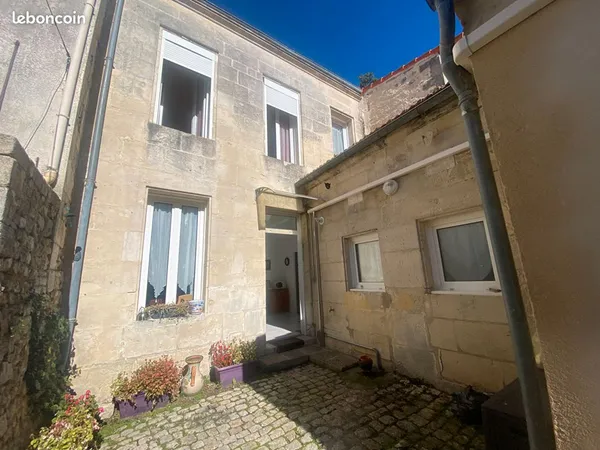 Maison 2 pièces 55 m² avec cour privative - DPE C - Vendue louée