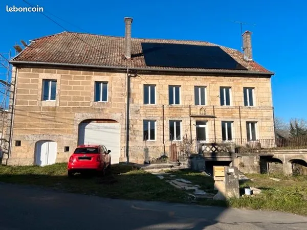 Propriété avec immeuble de 2 appartement + grange+ garage 40m2