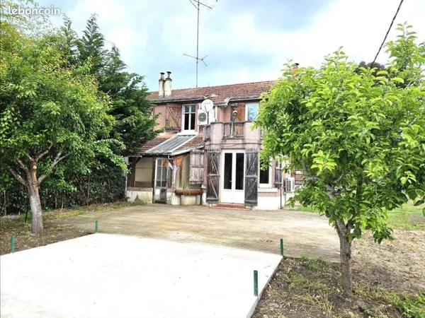 Maison Mitoyenne