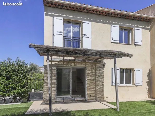 Maison mitoyenne avec jardin