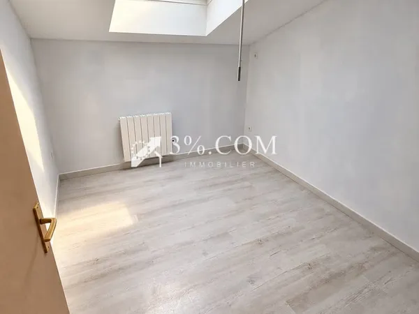 Maison de 90m2 avec terrasse et garage, proche du canal