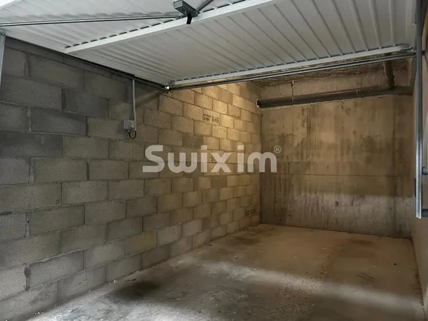 Garage sécurisé en sous-sol de 13 m² !