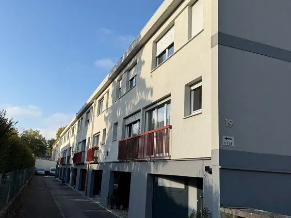 Triplex 4 pièces de 90 m² avec local professionnel