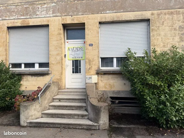 Appartement T5 de 97m2 dans une maison avec caves jardin et garage