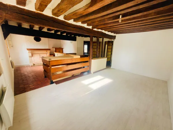 Immeuble avec local commercial et appartement