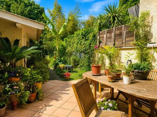 TOULOUSE BUSCA TOULOUSAINE DE 104 m² avec jardin et terrasse