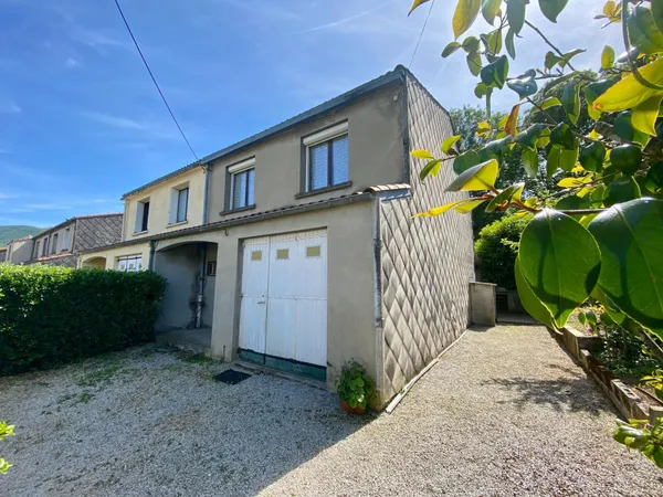 maison avec garage et jardin attenant